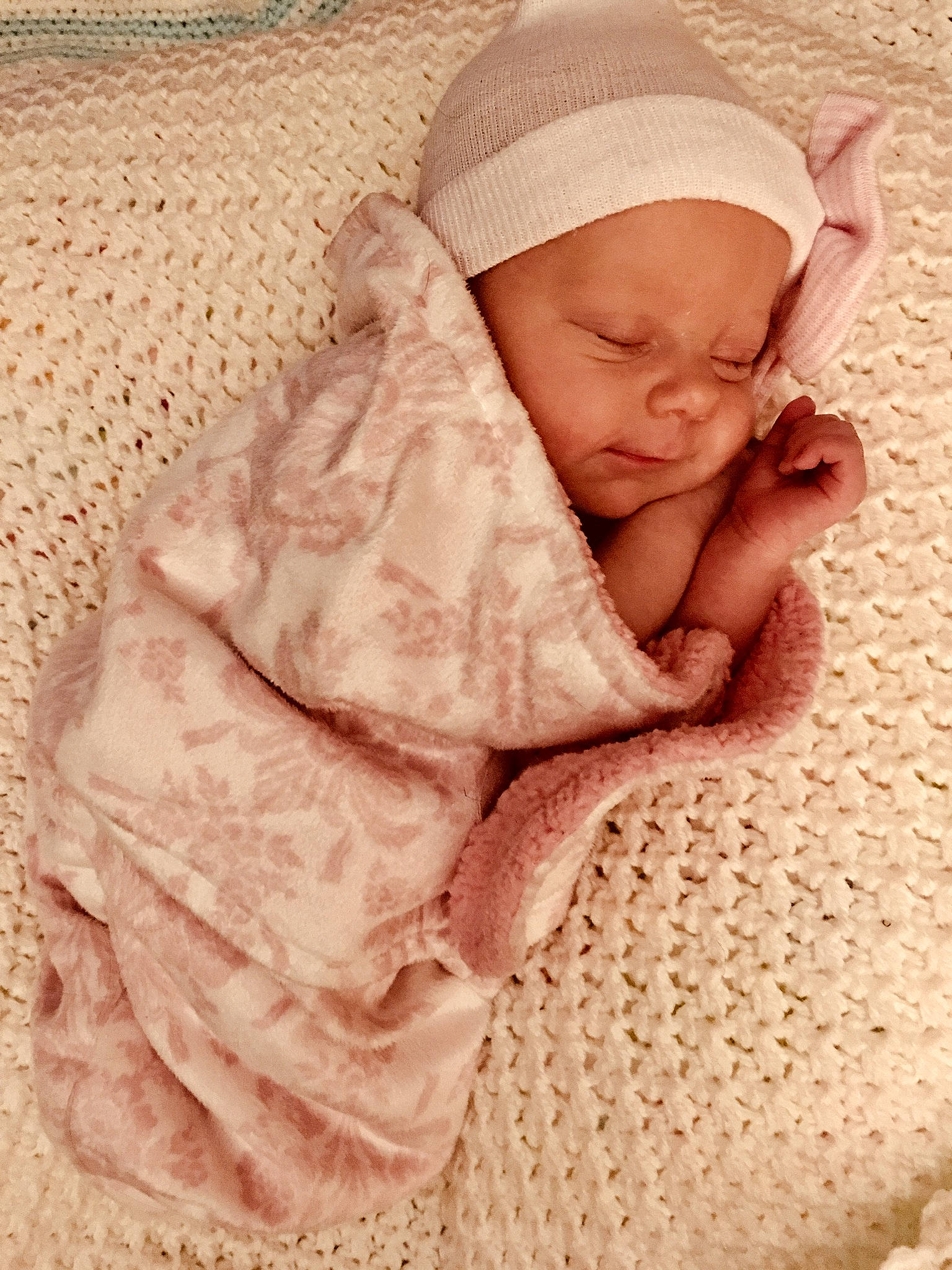 Addie is registered to the contest to win money with this photo: baby, baby_sleeping, blanket, bonnet, cheek, child, knitting, linens, person, pink, skin, sleep, textile, toddler, wool