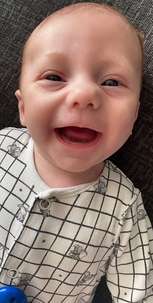 Cason is registered to the contest to win money with this photo: baby, baby_laughing, baby_toddler_clothing, cheek, cool, eyelash, happy, iris, jaw, lip, mouth, neck, nose, person, skin, sleeve, smile, toddler, tongue, tooth