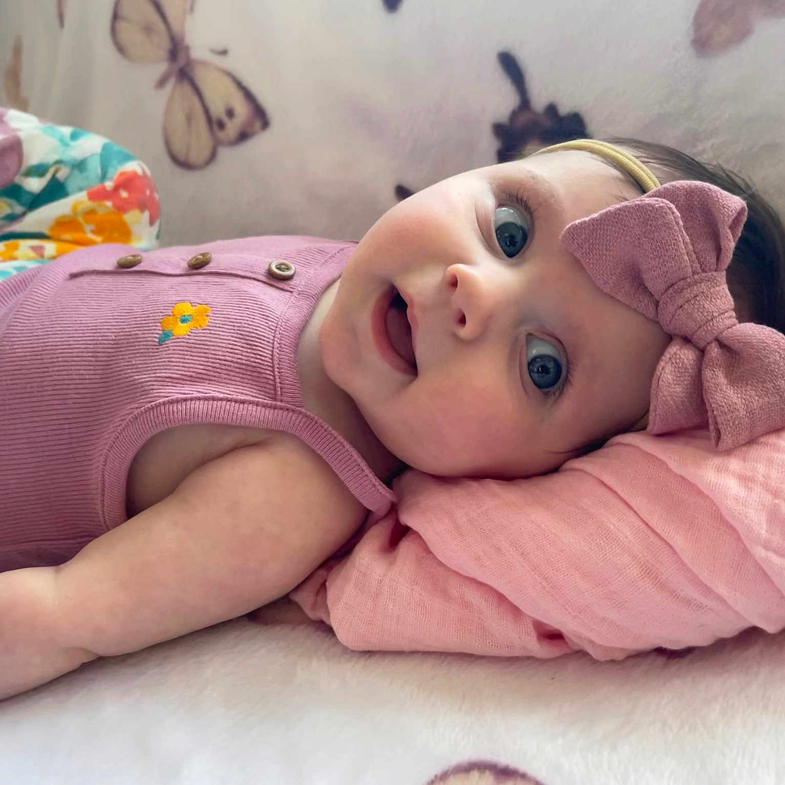Ava is registered to the contest to win money with this photo: baby, bed, bedroom, blanket, clothing, cushion, face, furniture, happy, hat, head, homedecor, indoors, newborn, person, photography, portrait, quilt, room, smile