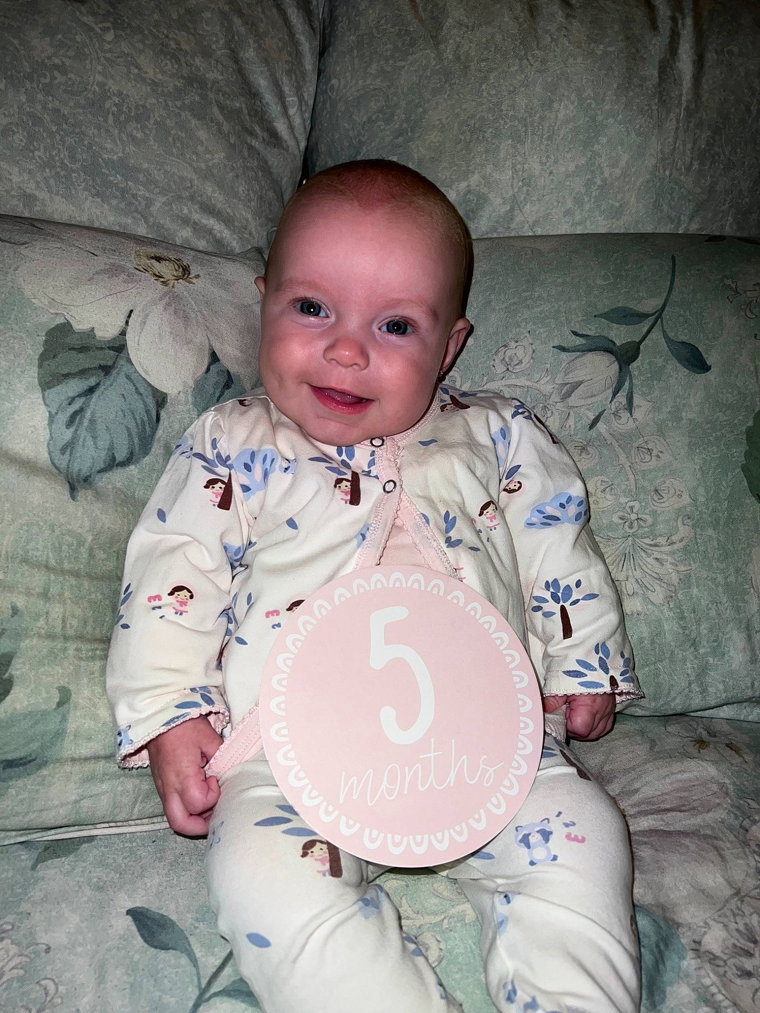 Pamela is registered to the contest to win money with this photo: baby, baby_toddler_clothing, cheek, child, comfort, cool, eye, flash_photography, fun, happy, joy, linens, mammal, mouth, person, skin, sleeve, smile, stomach, t_shirt