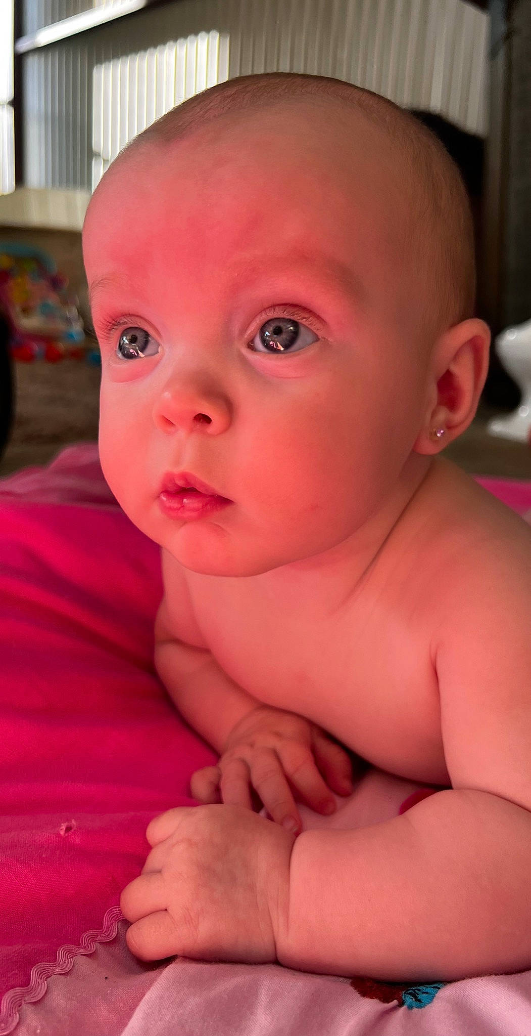 Pamela is registered to the contest to win money with this photo: baby, baby_toddler_clothing, cheek, chest, ear, eyebrow, eyelash, finger, fun, gesture, human_body, iris, lip, mouth, neck, nose, person, pink, skin, toddler