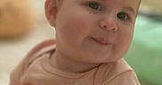 Luna is registered to the contest to win money with this photo: baby, baby_boy, baby_girl, cheeks, child, closeup, curious, cute, expression, eyes, face, indoors, infant, person, portrait, shirt, skin, smile, soft_light, young