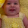 Luna joined the competition — help win amazing prizes! baby, smiling, yellow_dress, crocheted_blanket, flower, infant, portrait, happy, cute, child, closeup, face, skin, eyes, clothing, soft, warm, adorable, person, indoors