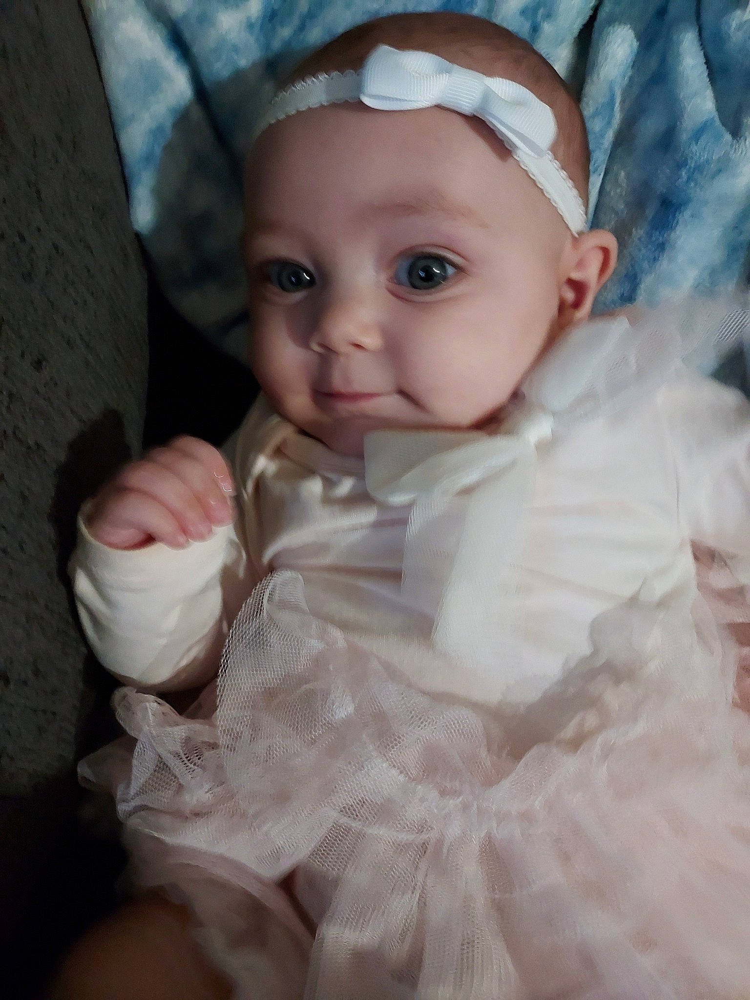 Ava is registered to the contest to win money with this photo: baby, baby_toddler_clothing, cap, cheek, child, comfort, dress, eye, eyebrow, eyelash, fashion_accessory, fur, hat, head, headwear, iris, lip, person, pink, skin