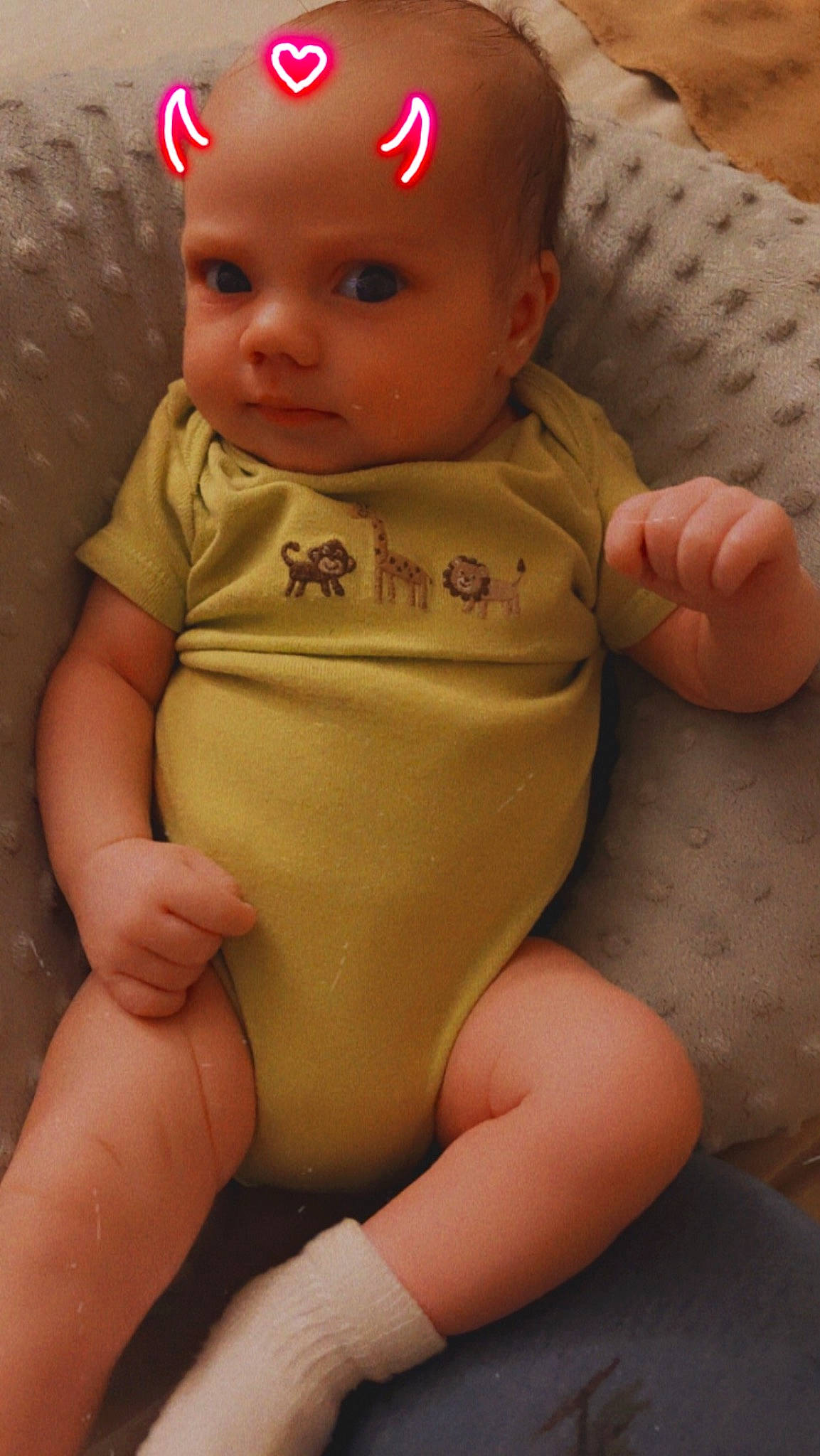 Zidas is registered to the contest to win money with this photo: baby, baby_toddler_clothing, cheek, chin, comfort, eye, eyebrow, face, finger, head, human_body, lip, nose, person, pink, product, skin, sleeve, stomach, thigh