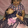 children, siblings, toddler, baby, smiling, sleeping, portrait, indoors, seated, dress, bow, plaid_shirt, pink, purple, blanket, bed, family, affection, happy, photography