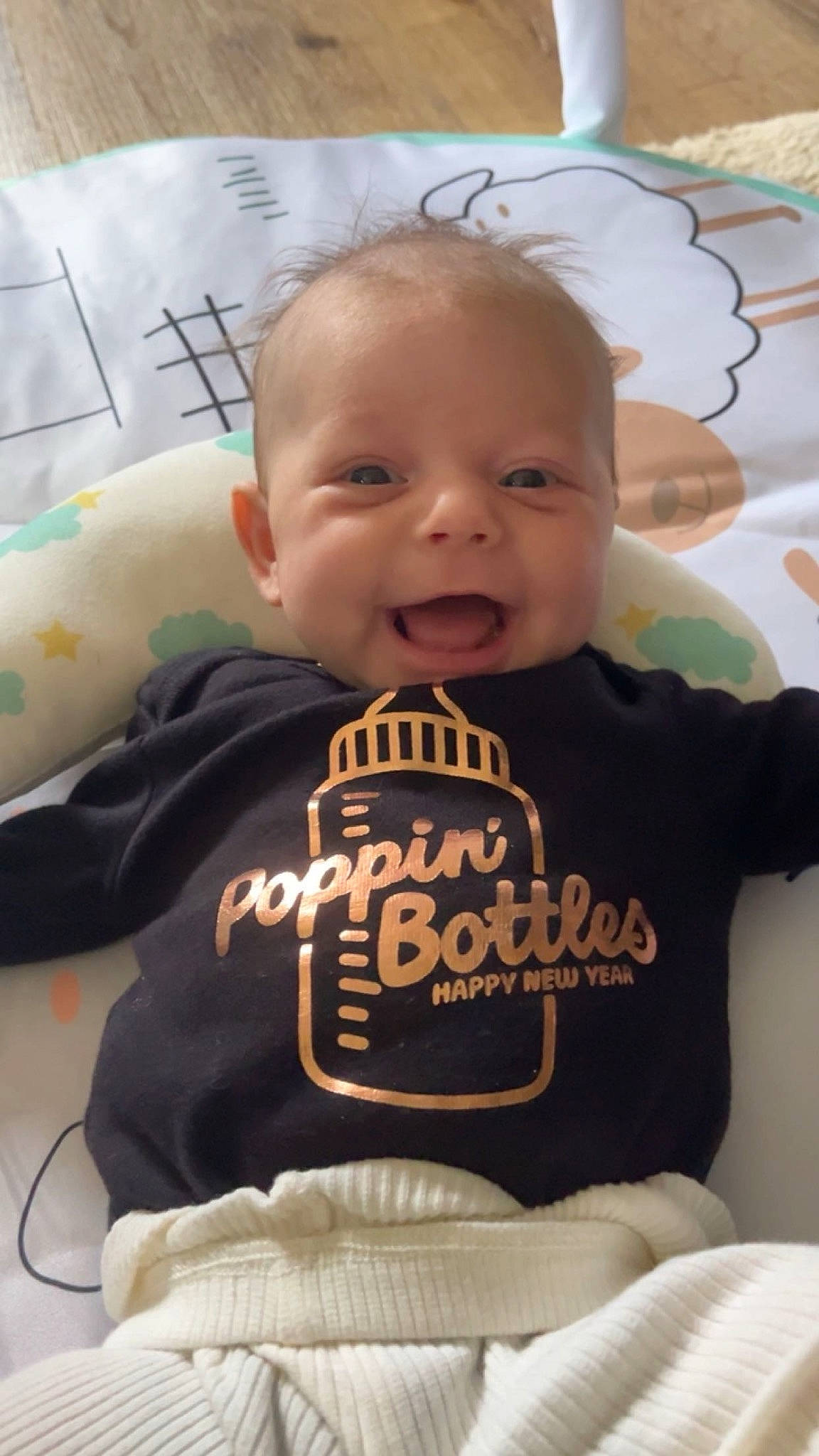 Raelynn is registered to the contest to win money with this photo: baby, baby_toddler_clothing, cheek, chin, comfort, face, facial_expression, finger, hairstyle, happy, head, human, mammal, nose, person, product, skin, sleeve, smile, t_shirt