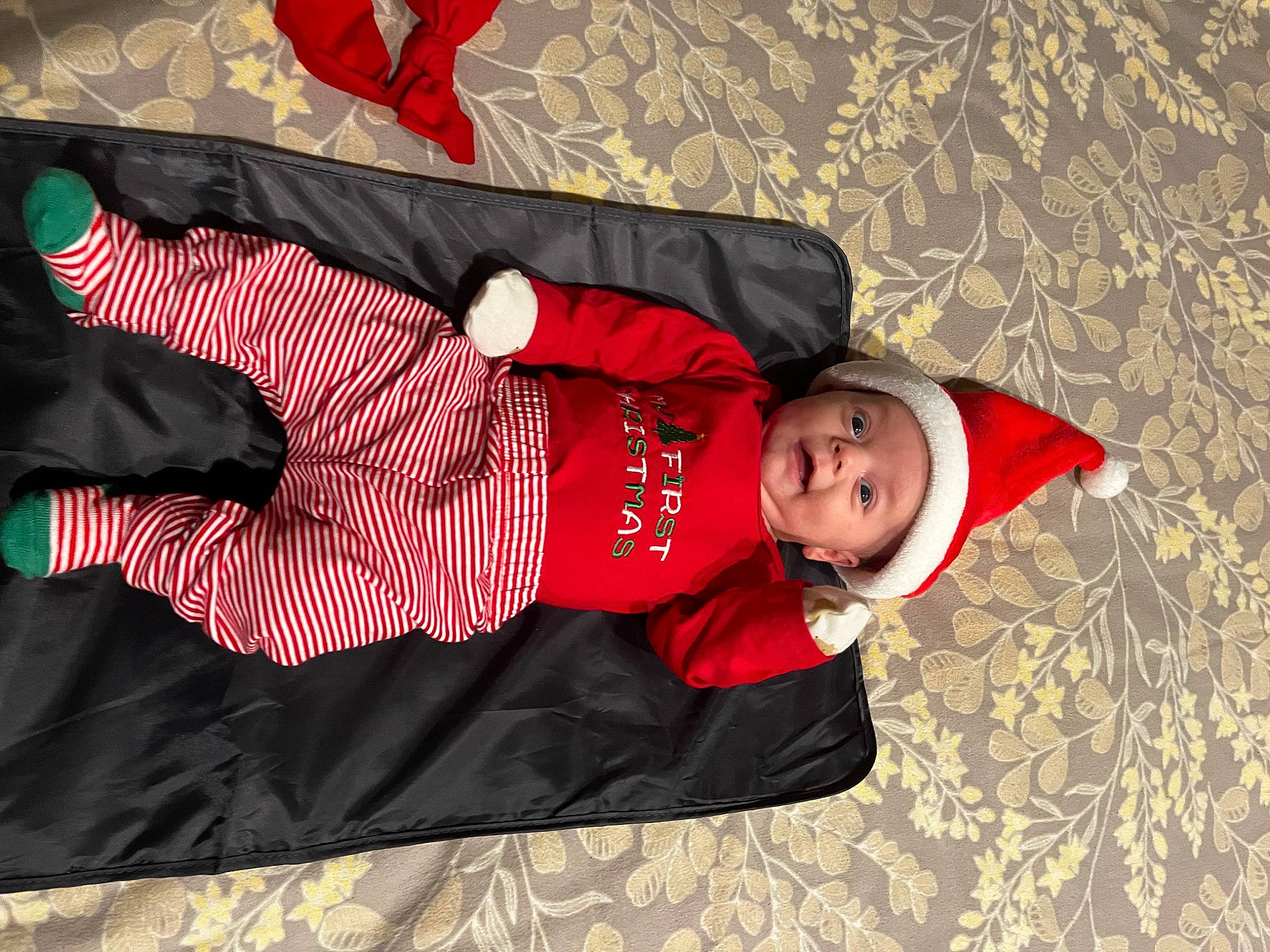 Raelynn joined the competition — help win amazing prizes! baby_toddler_clothing, carmine, child, comfort, flooring, fun, happy, headwear, human_leg, linens, magenta, pattern, person, pink, red, room, sleeve, t_shirt, textile, thigh