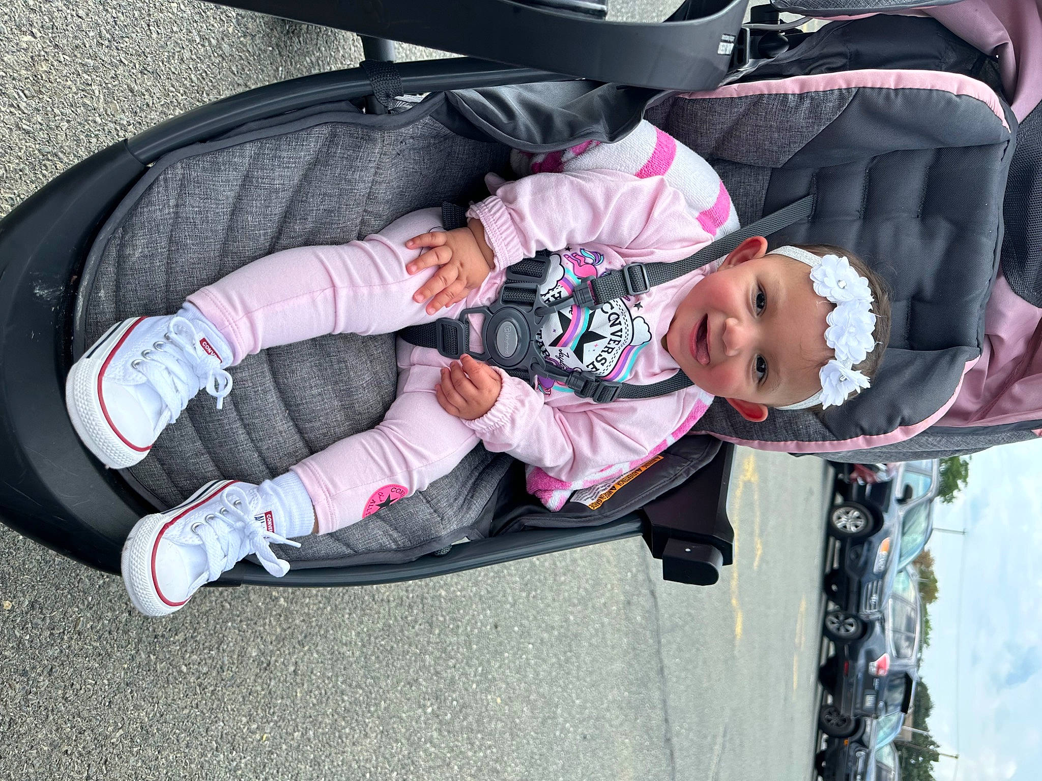 Journii is registered to the contest to win money with this photo: auto_part, automotive_exterior, baby, baby_products, baby_toddler_clothing, black, car, car_seat, carmine, comfort, family_car, fun, headwear, joy, lap, luxury_vehicle, person, plant, smile, toddler