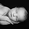 newborn, baby, sleeping, black_and_white, portrait, infant, peaceful, hands, face, skin, closeup, resting, soft, cute, child, young, lying_down, calm, studio, monochrome