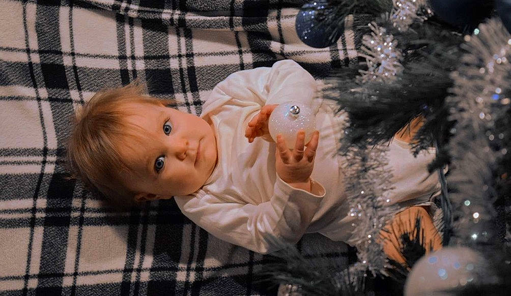 Catherine joined the competition — help win amazing prizes! baby, baby_toddler_clothing, cheek, christmas, christmas_decoration, christmas_ornament, christmas_tree, comfort, event, eye, happy, nose, pattern, person, plaid, plant, skin, tartan, toddler, tree