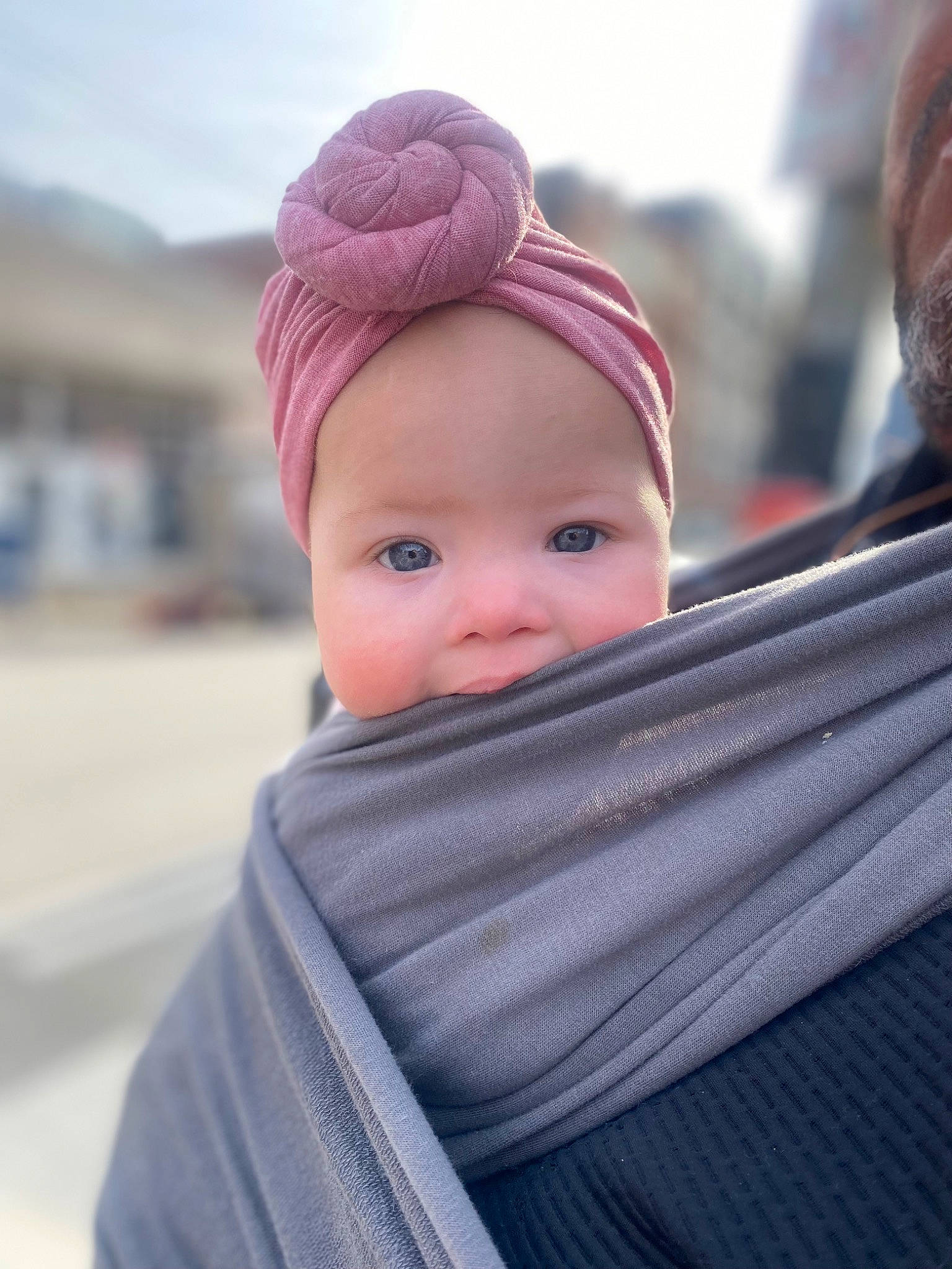 Willow is registered to the contest to win money with this photo: baby, beanie, bonnet, cap, child, electric_blue, fashion_accessory, fun, happy, headwear, knit_cap, landscape, magenta, pattern, person, portrait_photography, sky, toddler, travel, vacation