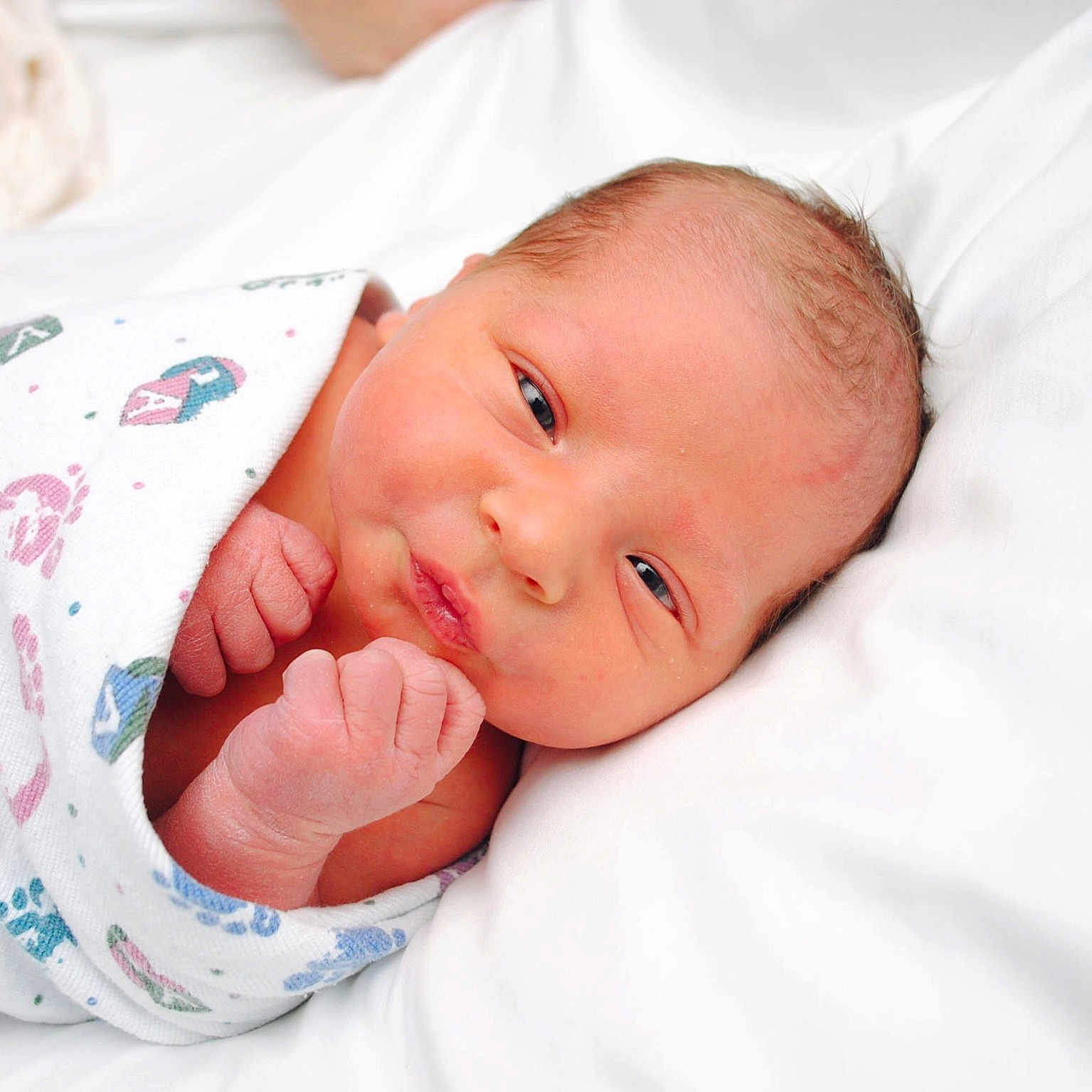 Westin is registered to the contest to win money with this photo: baby, bed, bedding, blanket, closeup, cute, face, fist, infant, newborn, newborn_baby, patterned_blanket, portrait, resting, skin, sleeping, soft, tiny, white, wrapped