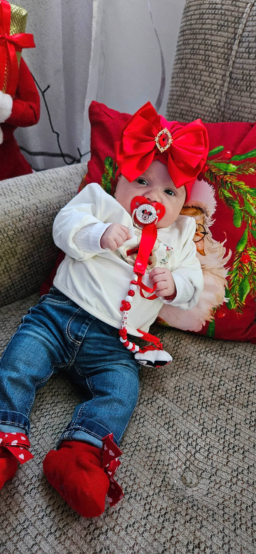 Mylena Selya participe au concours pour gagner de l'argent avec cette photo : baby, clothing, costume, couch, cushion, face, footwear, furniture, hat, head, homedecor, hosiery, jeans, pants, person, photography, portrait, shoe, sitting, sock