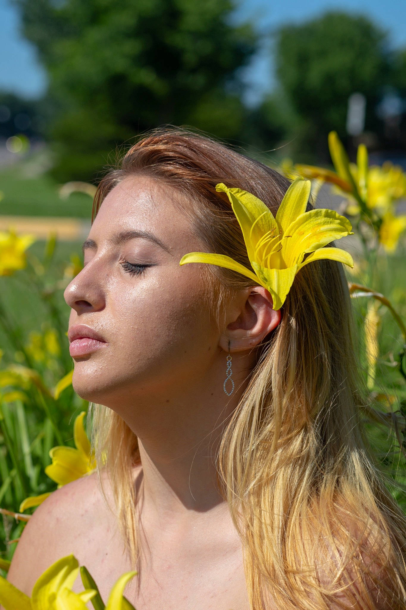 Riley joined the competition — help win amazing prizes! beauty, brown_hair, ear, fashion_accessory, flower, hair, hair_accessory, hairstyle, headband, headgear, headpiece, long_hair, people_in_nature, person, plant, wildflower, yellow