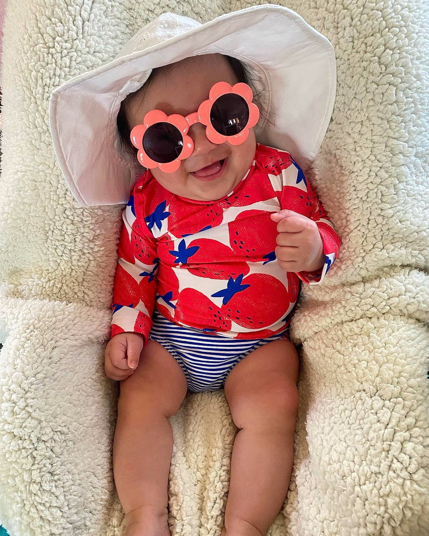 Jade is registered to the contest to win money with this photo: arm, baby_toddler_clothing, dress, eyewear, finger, glasses, goggles, hand, human_body, leg, lip, neck, person, shorts, shoulder, sleeve, sunglasses, textile, thigh, vision_care