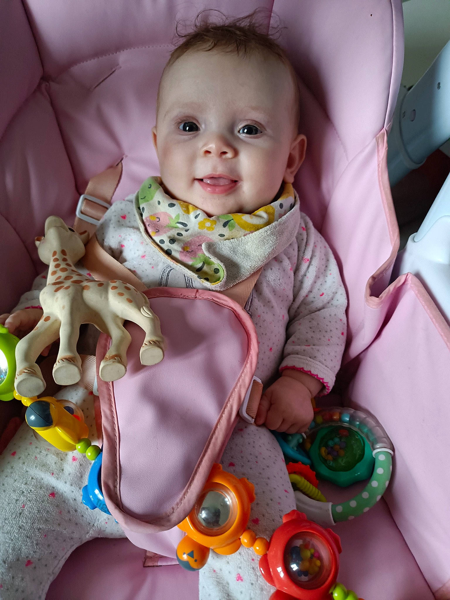 Tessa participe au concours pour gagner de l'argent avec cette photo : baby, baby_products, baby_toddler_clothing, cheek, child, comfort, eye, fun, happy, head, human_body, iris, mouth, person, pink, room, skin, sleeve, smile, textile