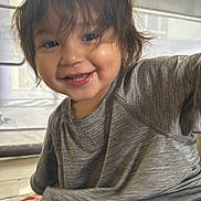 Kosei joined the competition — help win amazing prizes! child, toddler, smiling, indoor, gray_shirt, hair, face, happy, window, natural_light, candid, portrait, young, person, movement, skin, cheeks, hands, floor, home