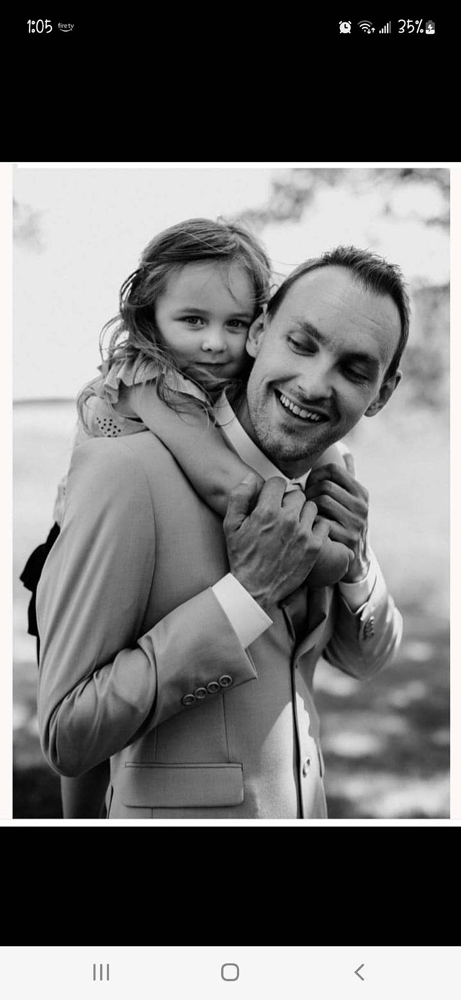 Gabriella is registered to the contest to win money with this photo: beauty, black_and_white, child, flash_photography, fun, fur, gesture, grass, happy, hug, joy, monochrome, monochrome_photography, outerwear, people, people_in_nature, person, smile, snapshot, stock_photography