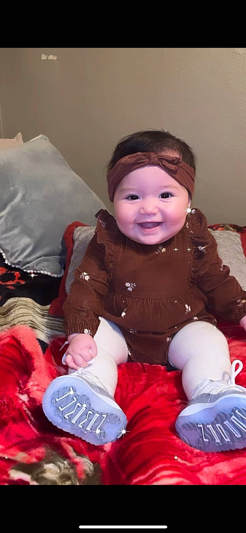 Annalise joined the competition — help win amazing prizes! baby, baby_toddler_clothing, cheek, child, christmas, eye, face, facial_expression, fun, happy, head, headgear, headwear, joy, lap, person, pink, purple, sitting, skin