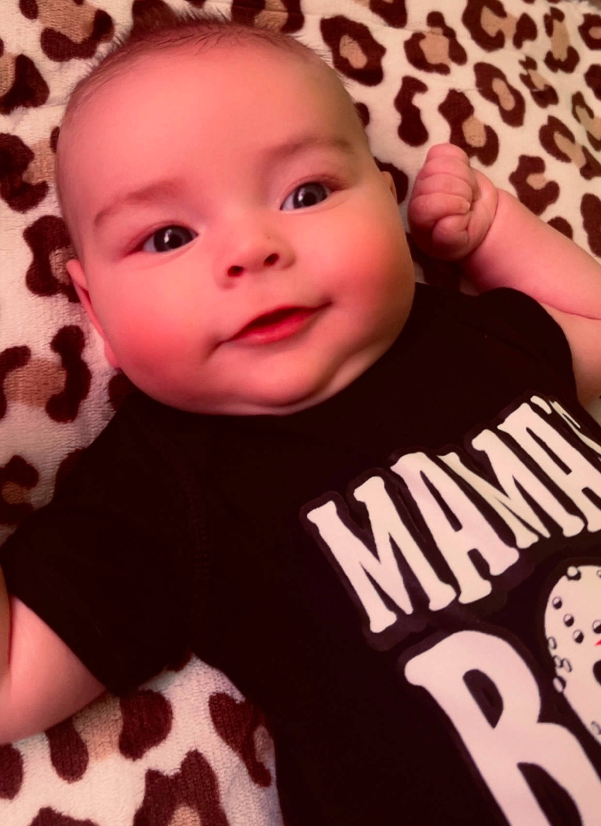 Carter is registered to the contest to win money with this photo: baby, baby_toddler_clothing, cheek, chin, eyebrow, face, finger, gesture, happy, head, human_body, lip, mammal, mouth, nose, person, pink, skin, sleeve, smile