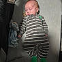 Oliver joined the competition — help win amazing prizes! baby, sleeping, crib, onesie, striped_clothing, plush_toy, pacifier, footed_pajamas, infant, child, sleep, soft_toy, gray, green, cozy, cute, indoor, bed, peaceful, nap