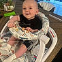 Mason is registered to the contest to win money with this photo: baby, infant, child, smiling, baby_bouncer, teether, socks, adidas_shorts, patterned_fabric, rainbow_pattern, wooden_table, succulent, indoor, living_room, sofa, window, happy, portrait, toy, feeding_seat
