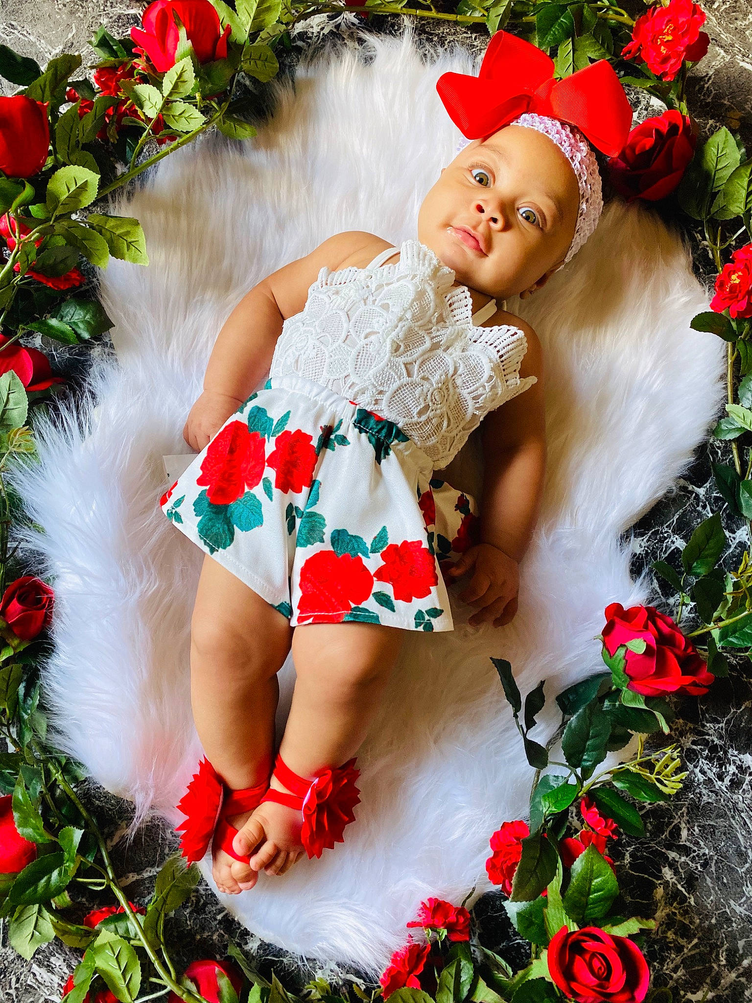 Tyla is registered to the contest to win money with this photo: child, christmas, christmas_decoration, christmas_eve, christmas_ornament, fictional_character, fir, flower, holiday, holly, interior_design, person, petal, photo_shoot, photography, plant, red, rose, rose_family, santa_claus