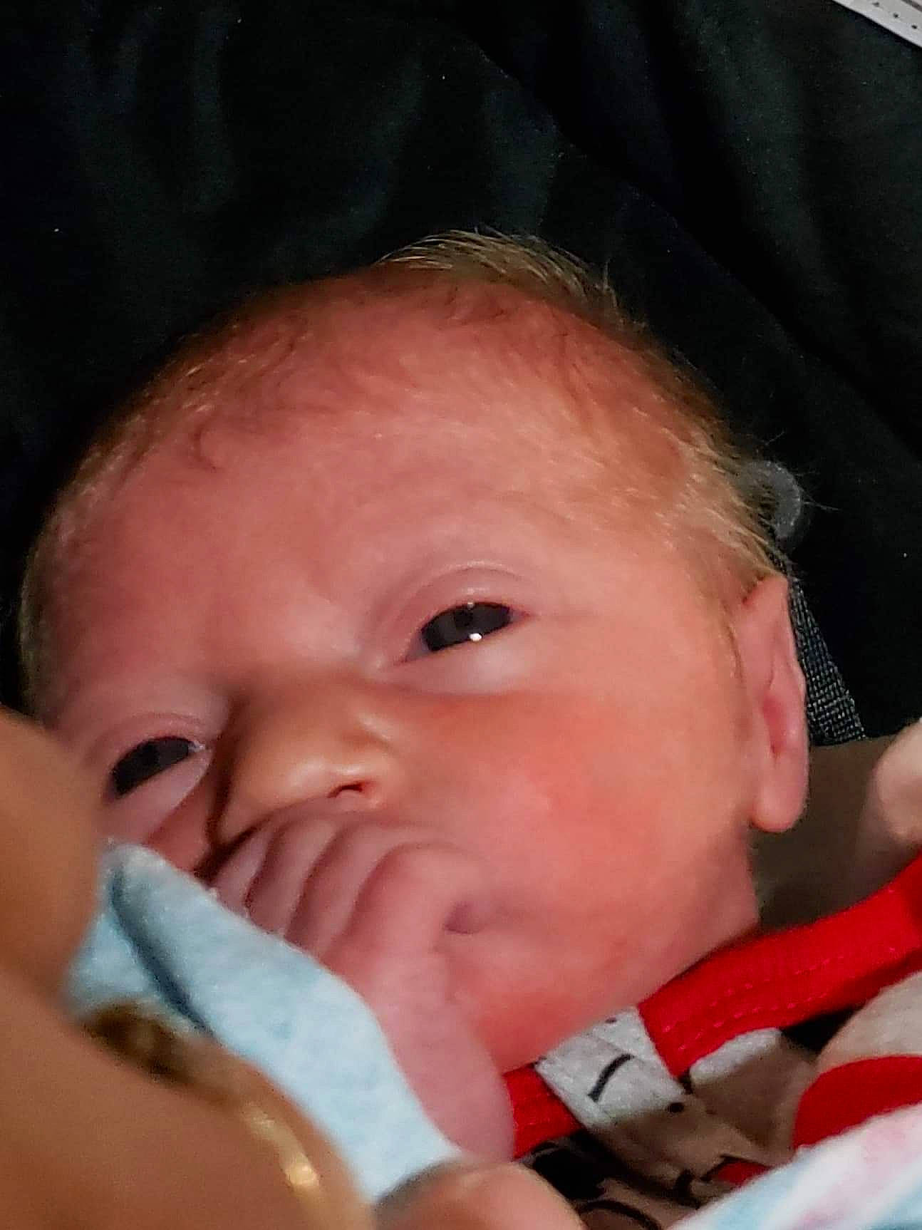 Wyatt is registered to the contest to win money with this photo: baby, cheek, child, chin, eye, face, finger, head, lip, mouth, nose, person, skin, toddler