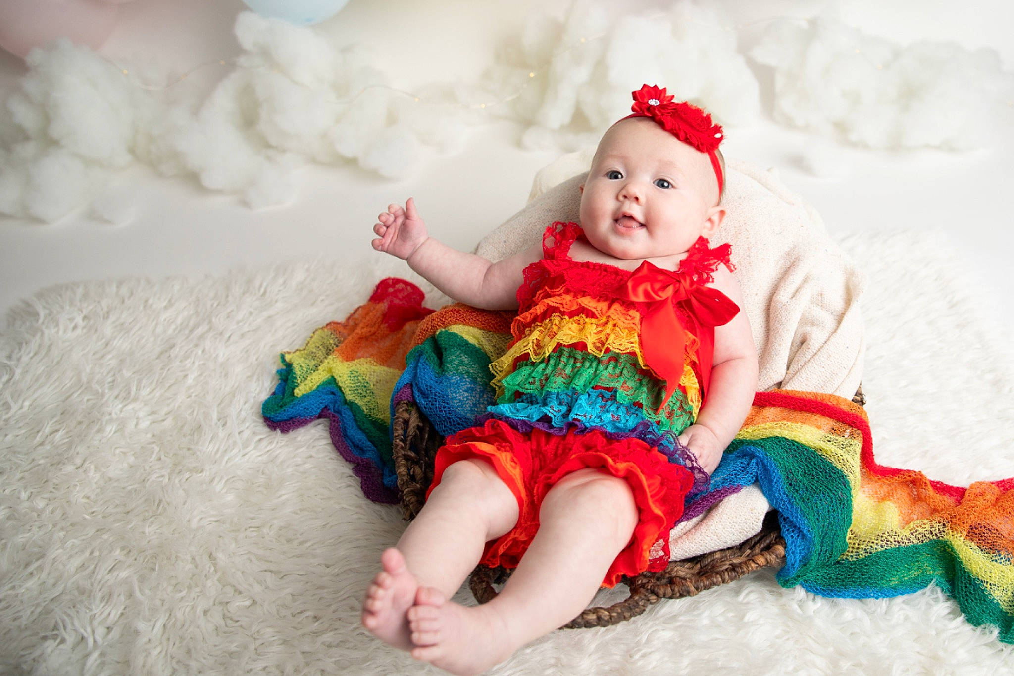 Mollie is registered to the contest to win money with this photo: baby, beauty, child, costume, fun, fur, hair_accessory, headgear, headwear, person, photo_shoot, photograph, photography, pink, red, sitting, skin, smile, textile, toddler