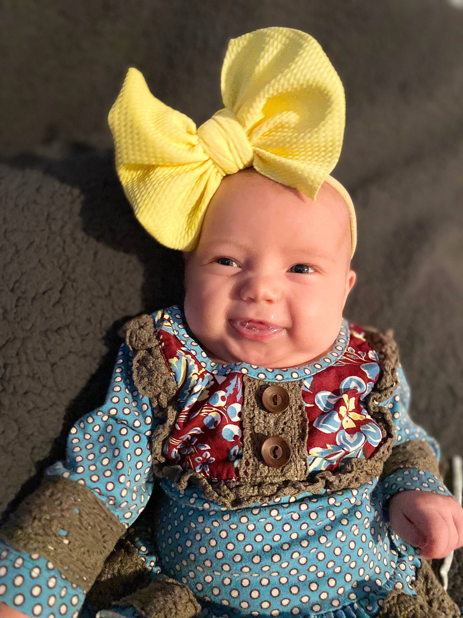 Alyza is registered to the contest to win money with this photo: baby, baby_toddler_clothing, child, clothing, costume_hat, dress, eye, face, happy, head, headgear, human_body, iris, outerwear, people_in_nature, person, skin, sleeve, smile, toddler