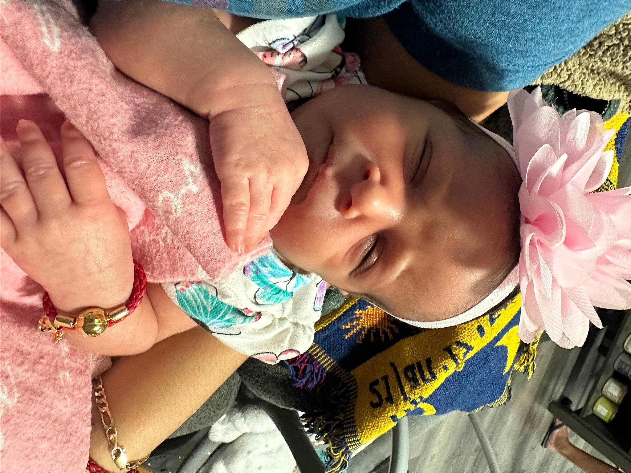 Hailey is registered to the contest to win money with this photo: baby, baby_toddler_clothing, blue, cheek, child, cool, eyelash, face, finger, gesture, hand, happy, human, mouth, nail, neck, person, pink, skin, thumb