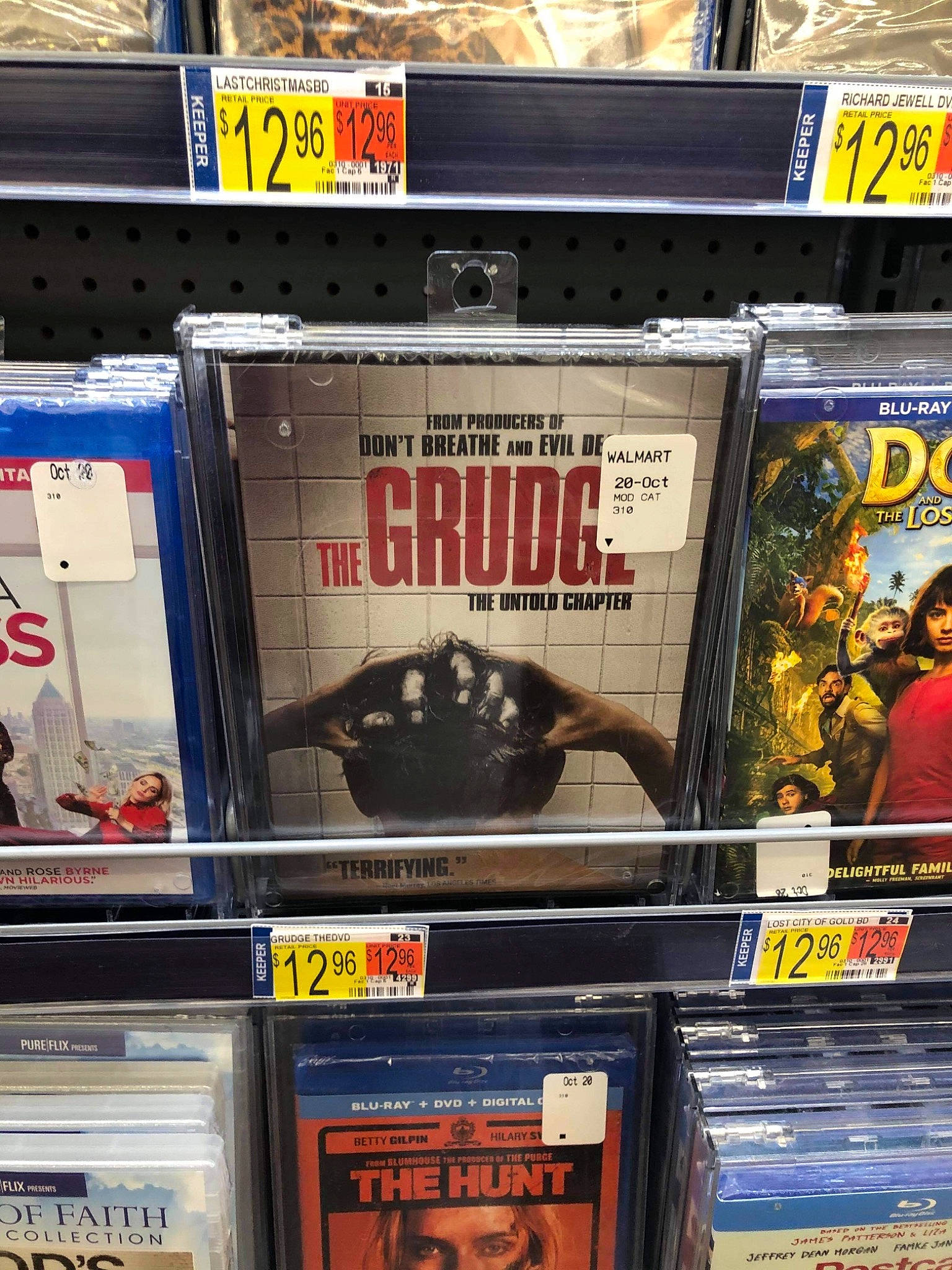 Drayco is registered to the contest to win money with this photo: advertising, auto_part, automotive_exterior, automotive_tire, automotive_wheel_system, bumper, collection, electronic_device, fictional_character, font, gadget, games, gas, machine, person, publication, recreation, retail, shelf, shelving