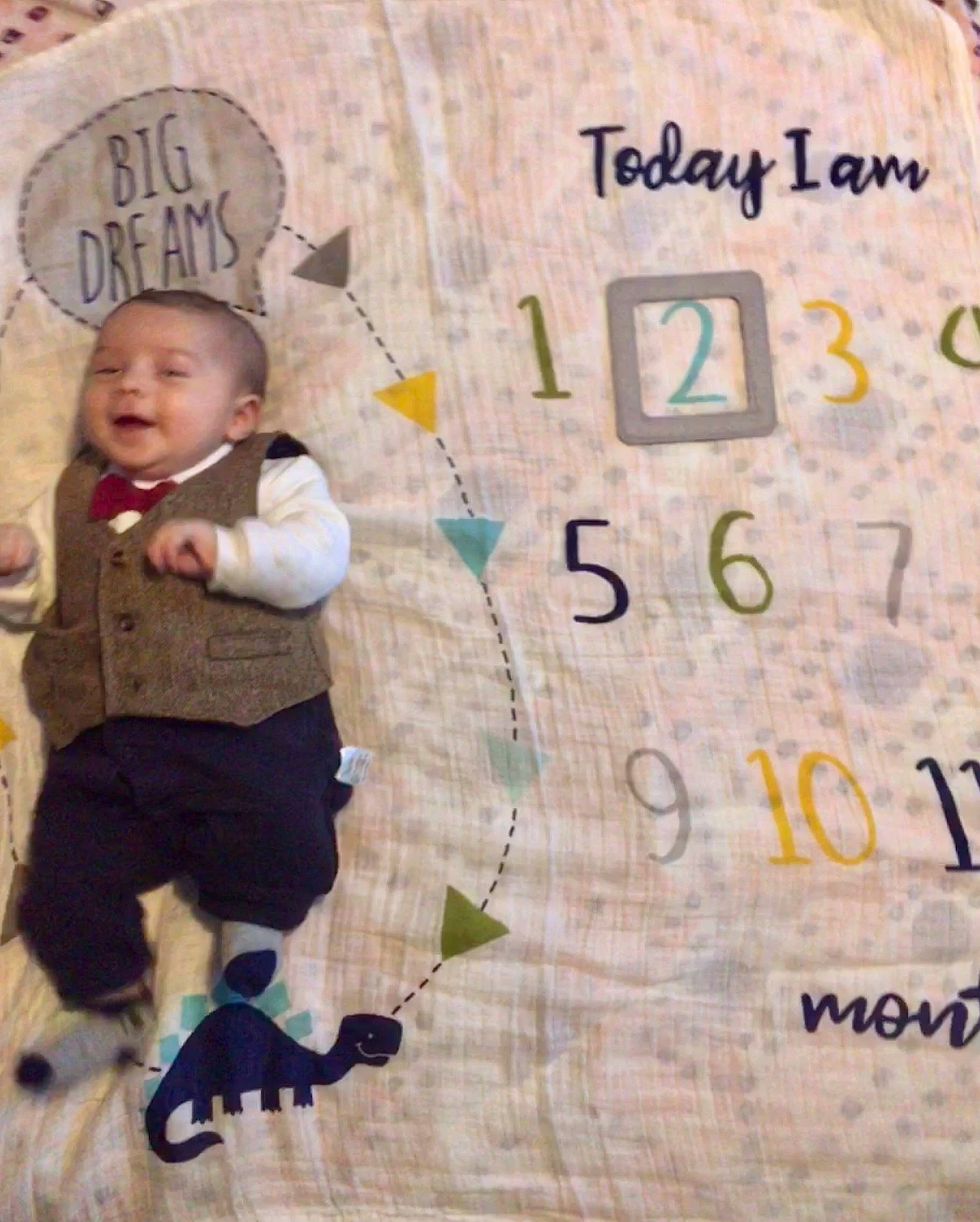 Drayco is registered to the contest to win money with this photo: art, baby, child, flooring, font, handwriting, happy, hat, number, paper, paper_product, pattern, people_in_nature, person, play, sitting, smile, t_shirt, toddler, tree