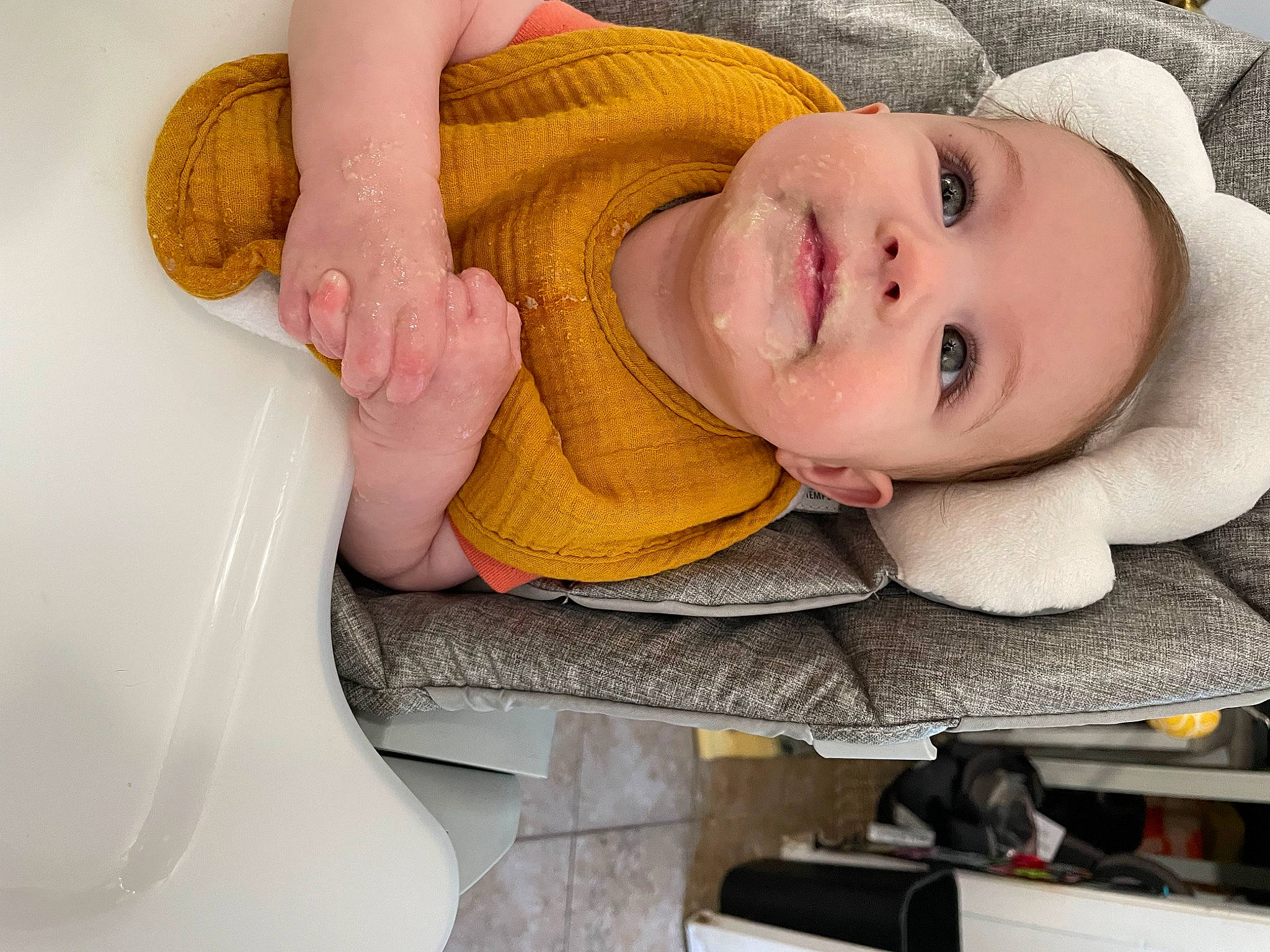 Lucy is registered to the contest to win money with this photo: baby, baby_products, baby_safety, baby_toddler_clothing, cheek, child, comfort, eye, fun, happy, headgear, joy, lip, nail, nose, person, room, sitting, skin, smile
