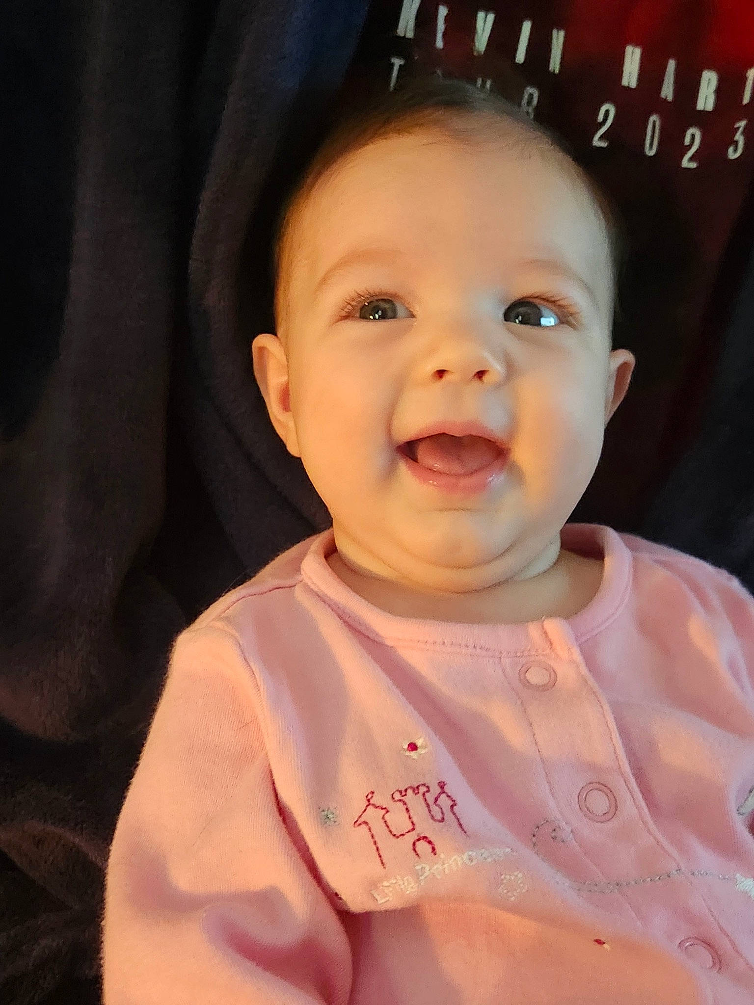 Lucy is registered to the contest to win money with this photo: baby, baby_toddler_clothing, cheek, chin, eye, eyebrow, face, facial_expression, happy, head, human_body, iris, lip, mouth, neck, nose, person, skin, sleeve, smile