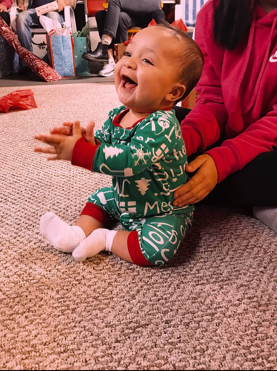 Bentley is registered to the contest to win money with this photo: baby, baby_toddler_clothing, carpet, child, event, flooring, foot, fun, grass, happy, human_leg, lap, leg, leisure, person, play, sitting, smile, soil, toddler