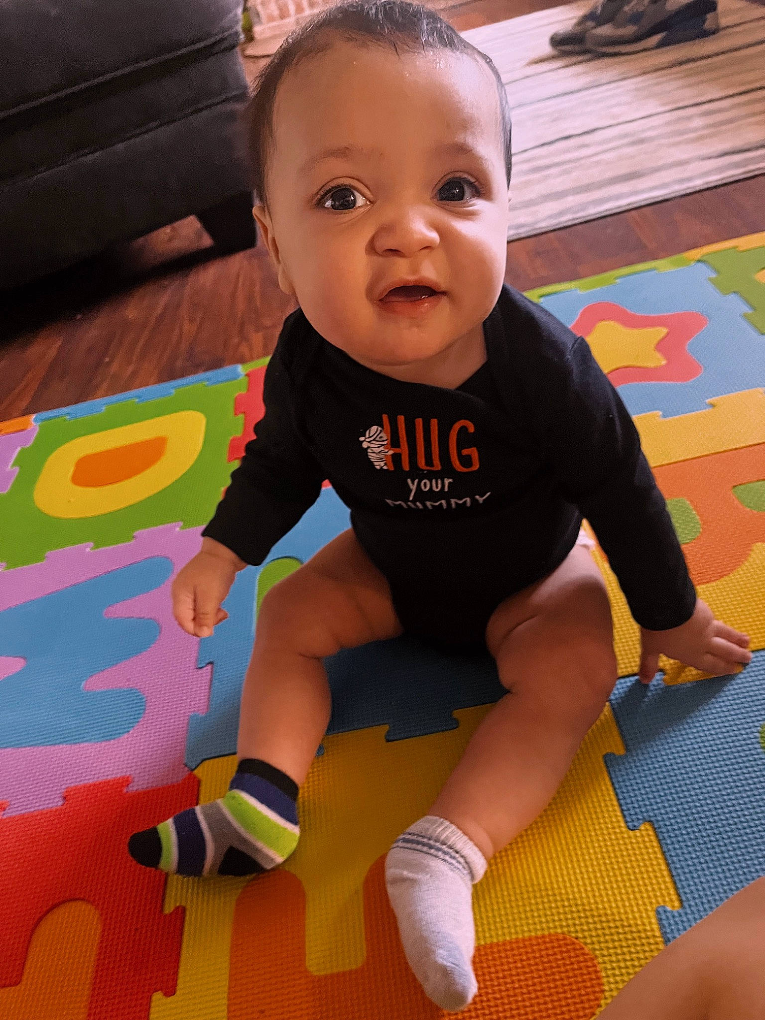 Bentley joined the competition — help win amazing prizes! baby, baby_toddler_clothing, cheek, child, facial_expression, finger, floor, flooring, fun, happy, head, human_leg, knee, person, product, skin, sleeve, smile, snapshot, thigh