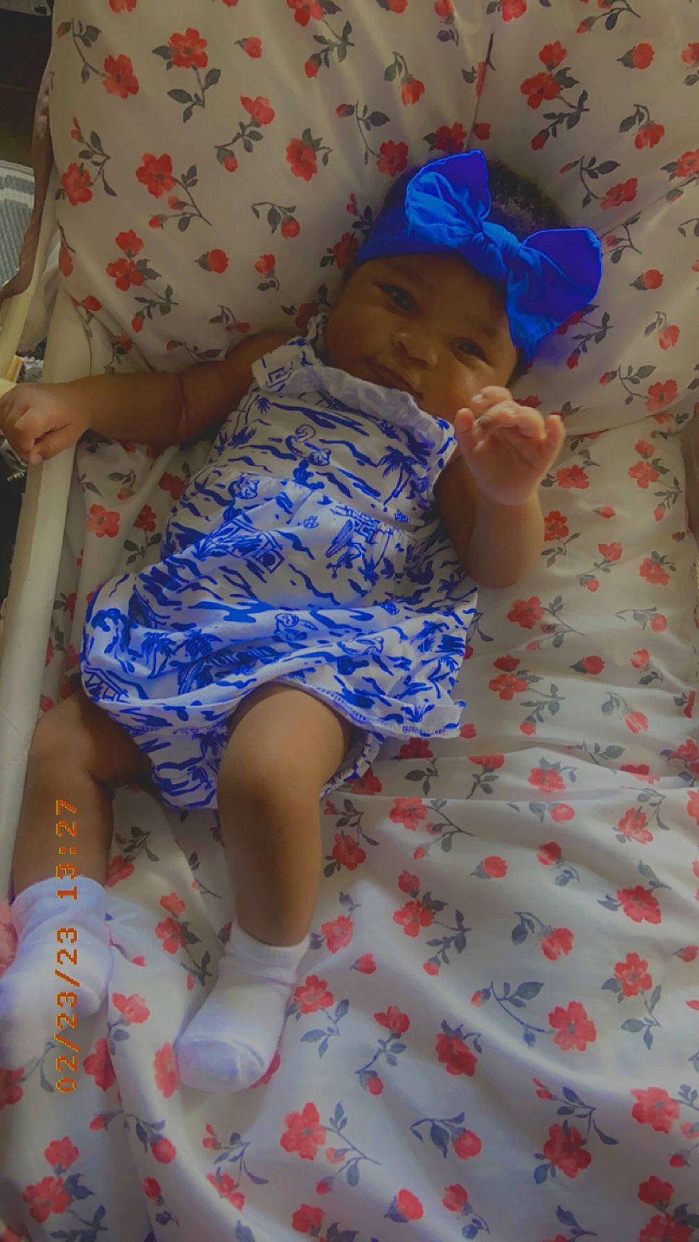 Kayleigh joined the competition — help win amazing prizes! baby_toddler_clothing, chair, child, comfort, foot, hat, head, headwear, human_leg, knee, lap, leg, linens, pattern, person, pink, purple, room, sock, textile