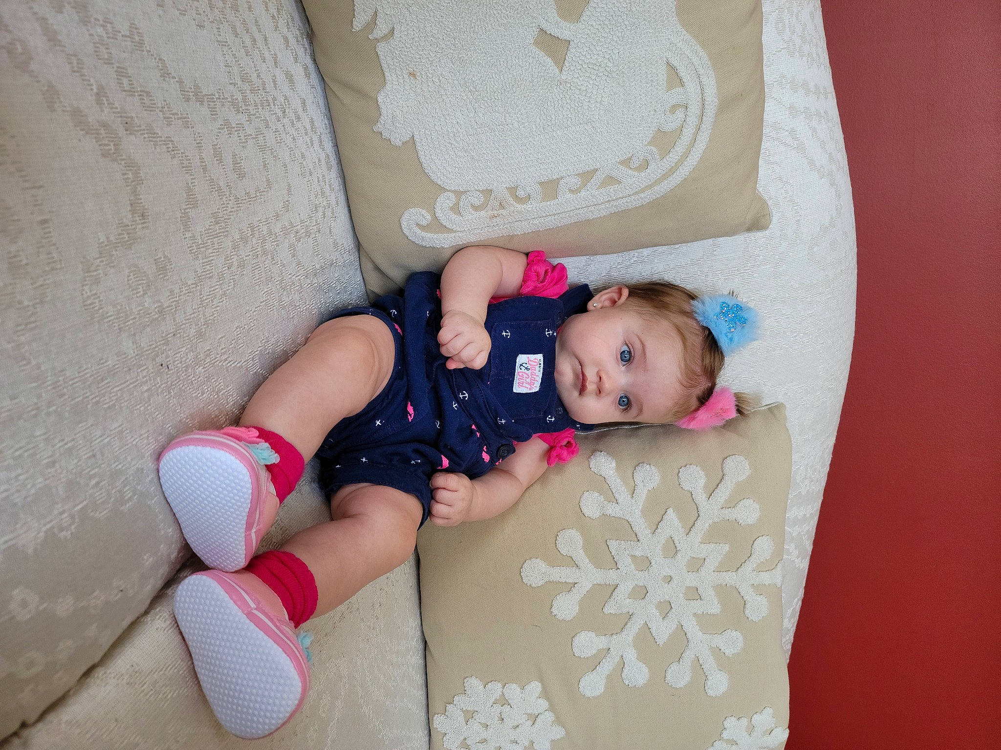 Kassandra is registered to the contest to win money with this photo: baby, baby_products, baby_sleeping, baby_toddler_clothing, child, comfort, happy, headgear, human_leg, leg, linens, magenta, pattern, person, pink, skin, sock, textile, thigh, toddler