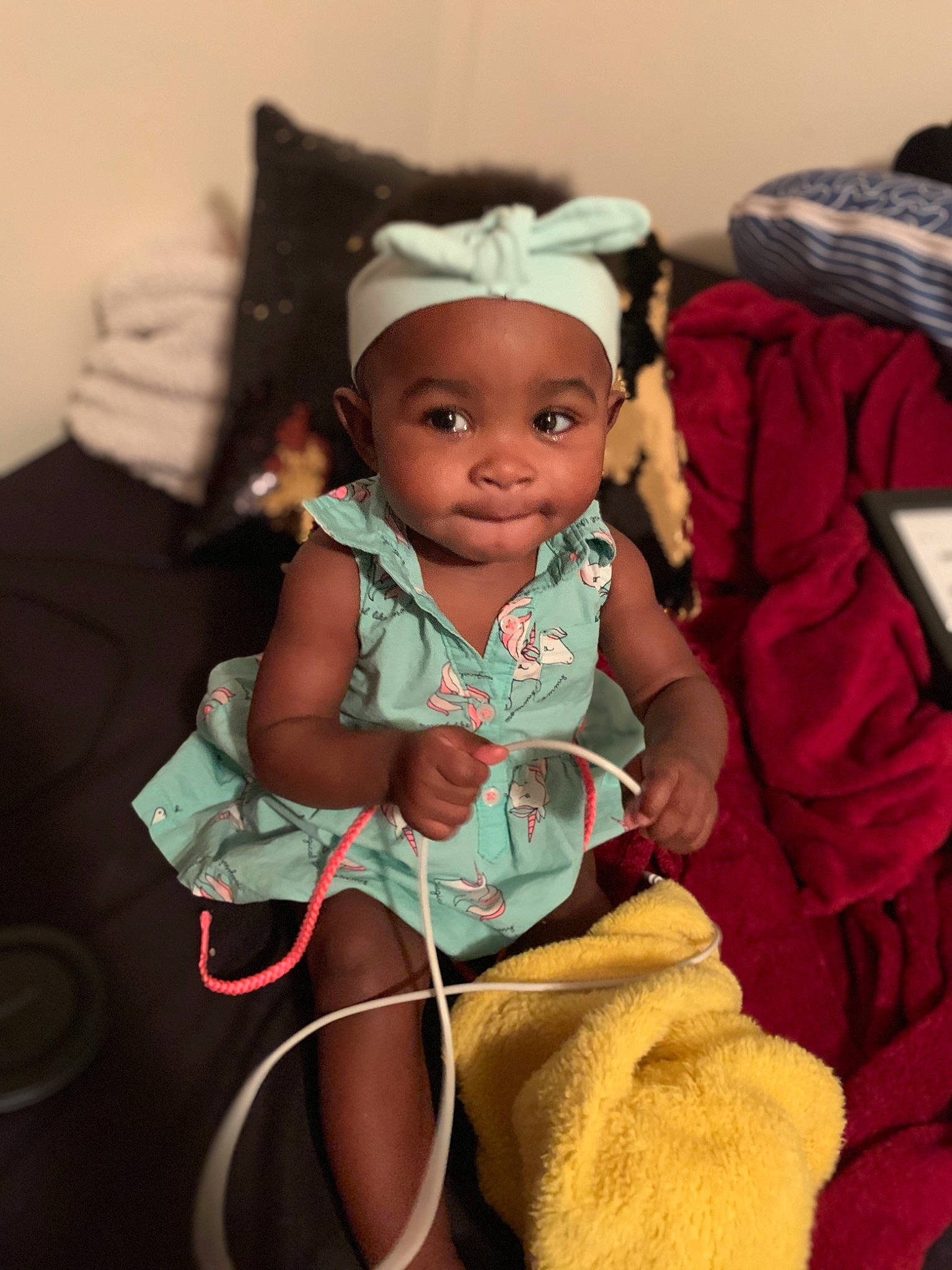 Cassidy joined the competition — help win amazing prizes! baby, baby_products, baby_toddler_clothing, child, comfort, costume, event, fashion_accessory, fun, happy, jewellery, leisure, magenta, person, room, sitting, skin, smile, toddler, tradition