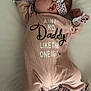 baby, sleeping, crib, onesie, headband, pink, leopard_print, infant, foot, hand, clothing, bed, blanket, cute, child, sleep, apparel, fabric, text, soft