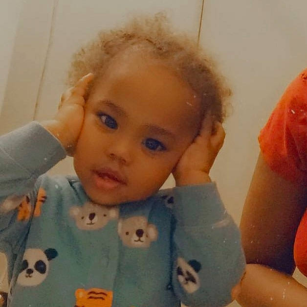 Keon is registered to the contest to win money with this photo: baby, baby_grabbing_for_something, baby_toddler_clothing, blond, button, cheek, child, eyebrow, forehead, iris, lip, person, pleased, skin, toddler