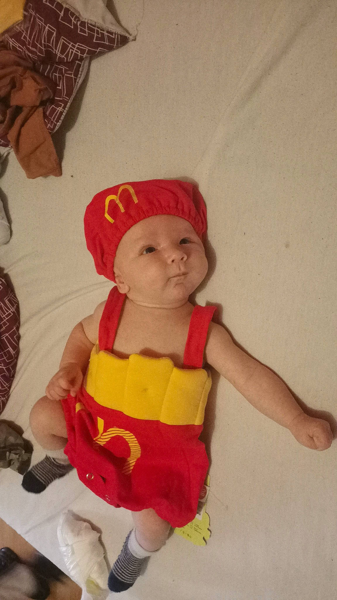 Kameron participe au concours pour gagner de l'argent avec cette photo : baby, baby_products, baby_toddler_clothing, cap, carmine, child, costume, costume_hat, doll, eye, fictional_character, hat, headgear, headwear, human_leg, person, room, sleeve, stuffed_toy, thigh