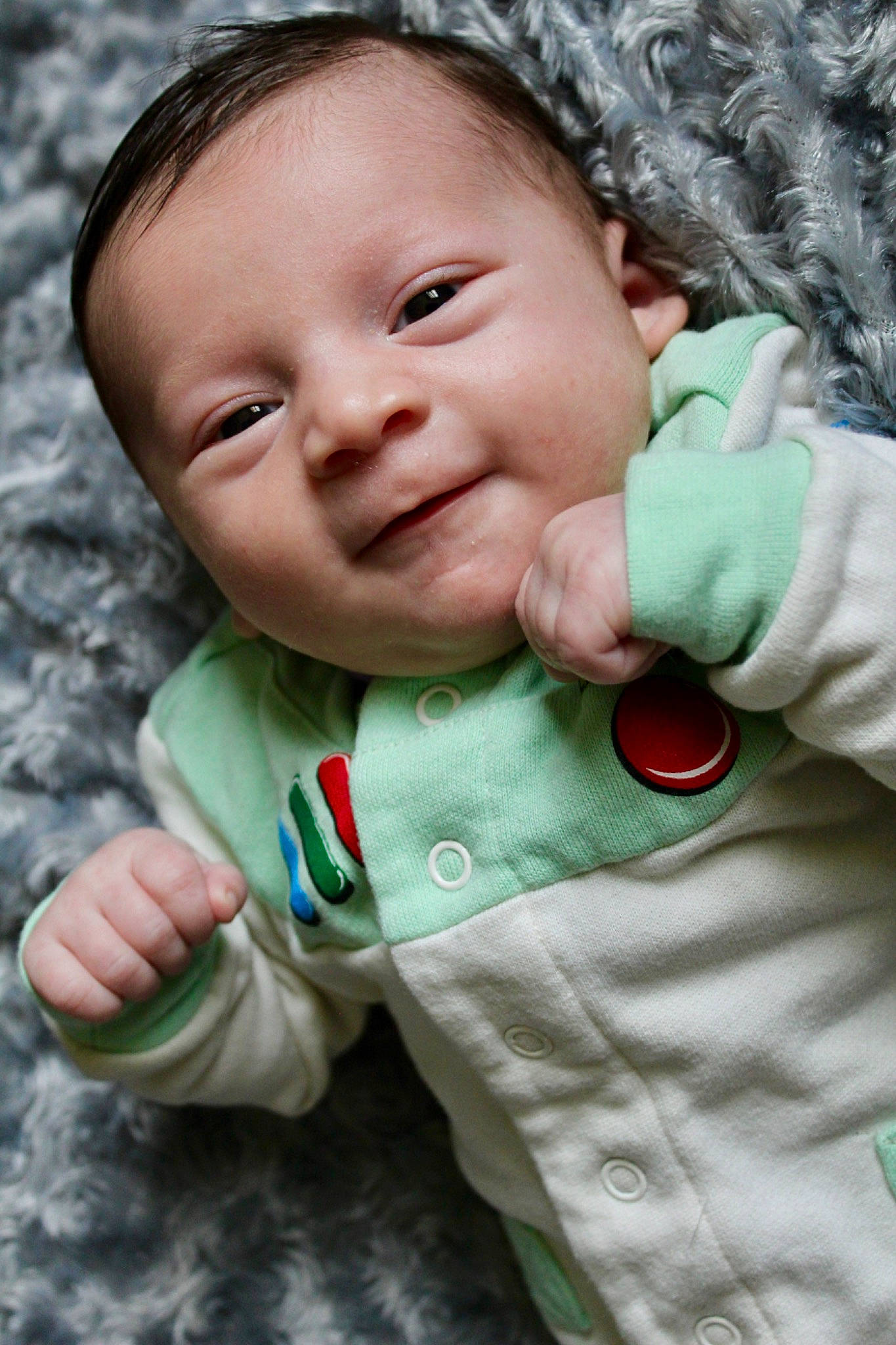 Briar is registered to the contest to win money with this photo: baby_toddler_clothing, cheek, eye, finger, flash_photography, gesture, green, hand, happy, jacket, lip, mouth, nose, outerwear, people_in_nature, person, photograph, skin, sleeve, smile