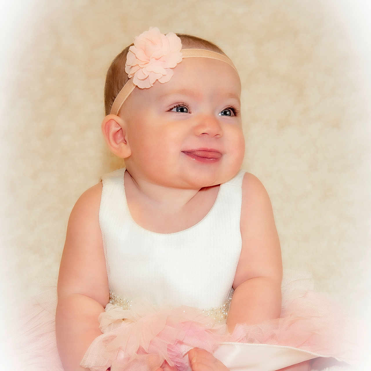 Aniceah is registered to the contest to win money with this photo: accessories, baby, bodypart, clothing, dress, face, finger, flower, hand, happy, head, headband, newborn, person, photography, portrait, sitting, smile, toe, wrist