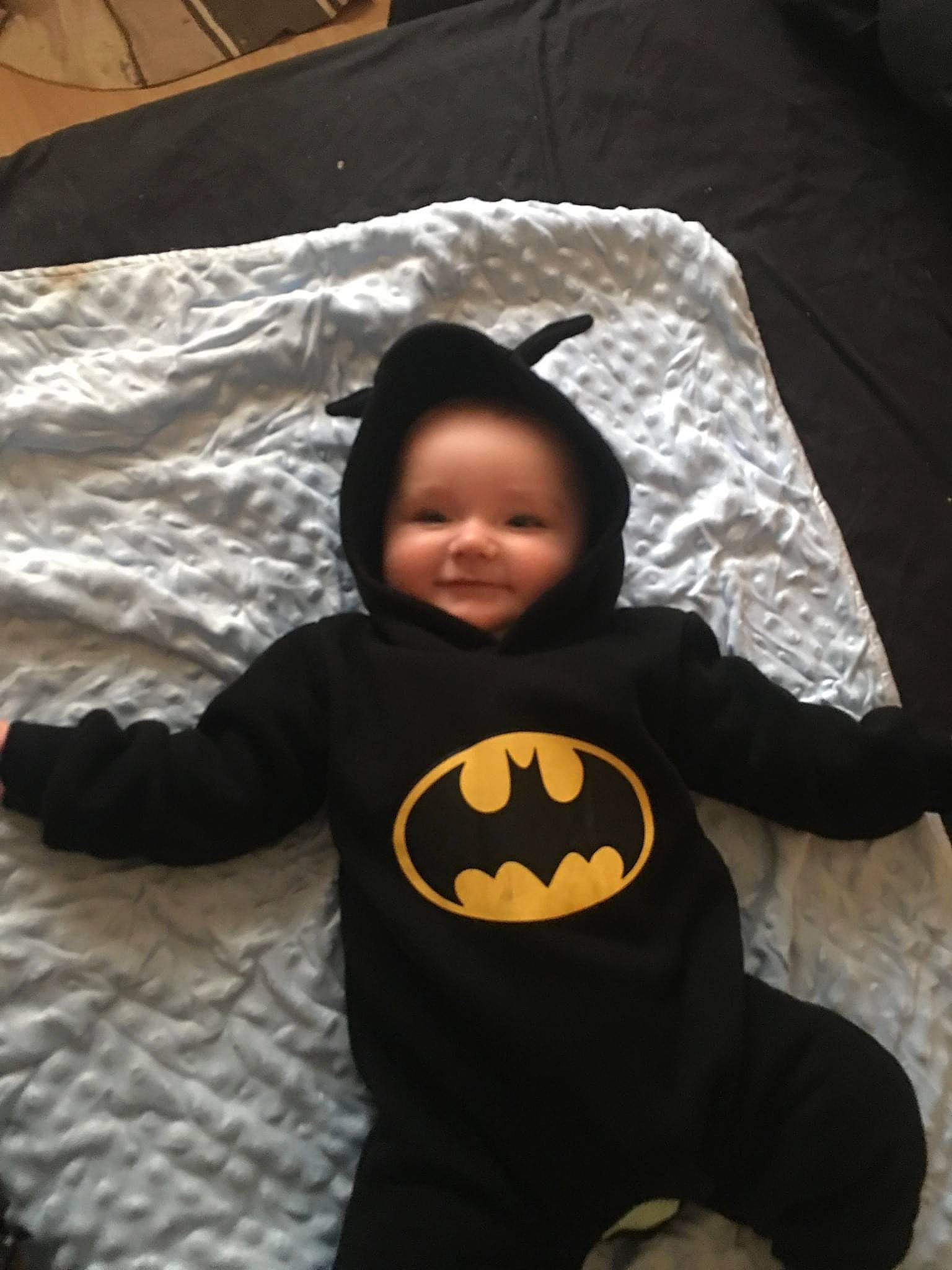 Leyton is registered to the contest to win money with this photo: active_shirt, baby, baby_products, baby_toddler_clothing, baby_toys, bed, bed_sheet, bedding, blanket, comfort, fictional_character, home_accessories, linens, long_sleeved_t_shirt, person, plush, stuffed_toy, textile, toddler, trick_or_treat