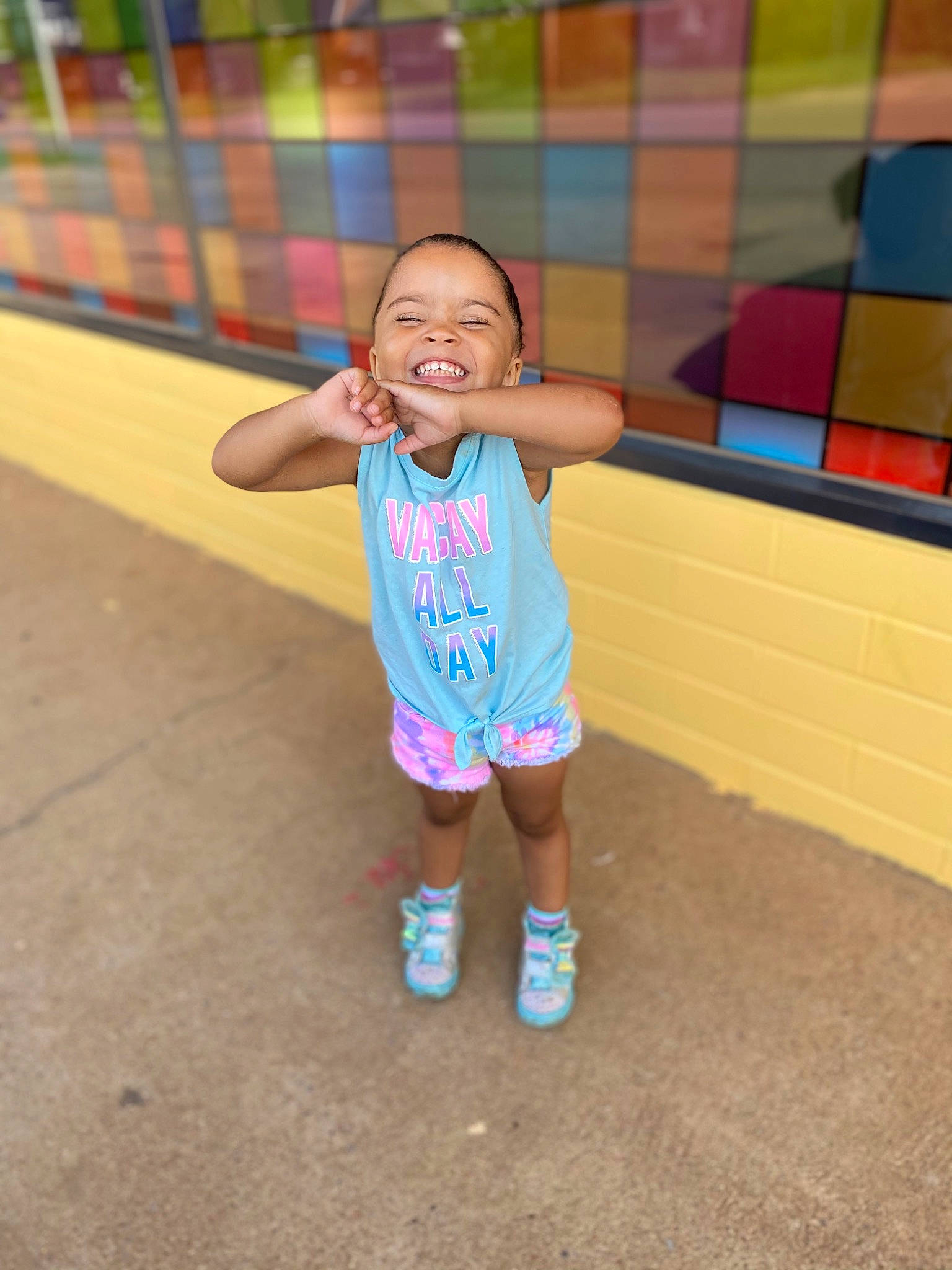 Milani joined the competition — help win amazing prizes! child, eye, finger, flooring, fun, glasses, grass, happy, head, leisure, magenta, pattern, person, recreation, sandal, shorts, skin, smile, t_shirt, thigh