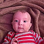 Buck joined the competition — help win amazing prizes! baby, blanket, child, cozy, cute, drool, face, gray, head, indoor, infant, lying_down, person, portrait, red, skin, soft_texture, striped_clothing, wide_eyes, young