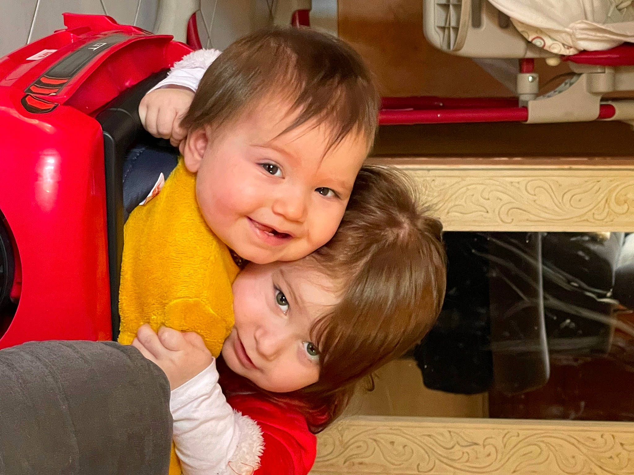 Pandora participe au concours pour gagner de l'argent avec cette photo : cheek, child, chin, comfort, event, eye, facial_expression, fun, happy, head, iris, joy, laugh, person, red, room, sitting, smile, standing, t_shirt